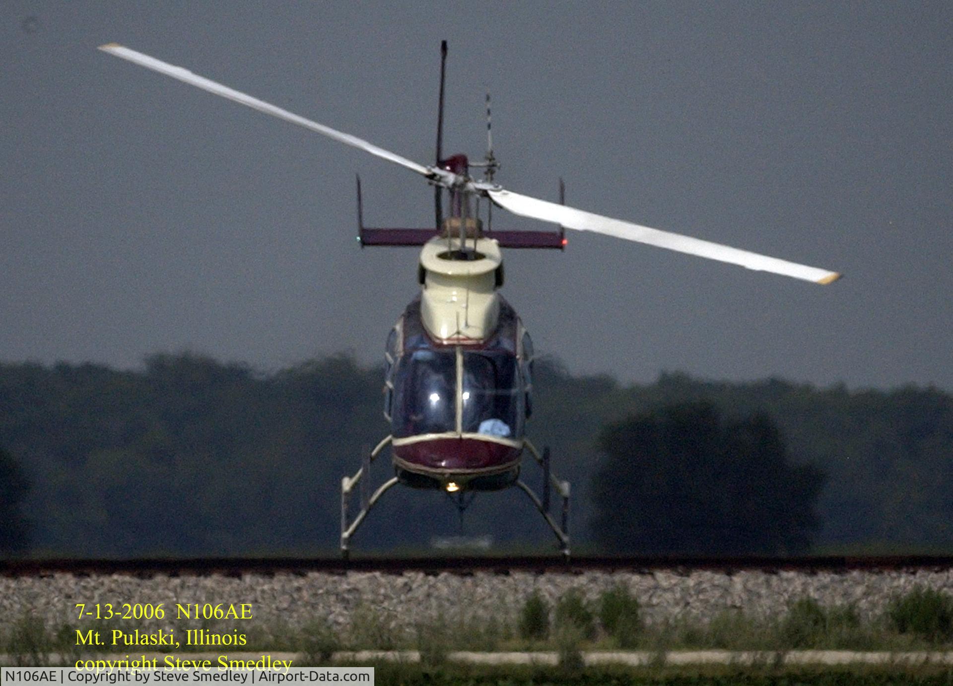 N106AE, 1981 Bell 206L-1 LongRanger II C/N 45566, Lift off following grain elevator stand by. Victim freed, walks away refuses treatment. Mt. Pulaski, Illinois 7-13-2006