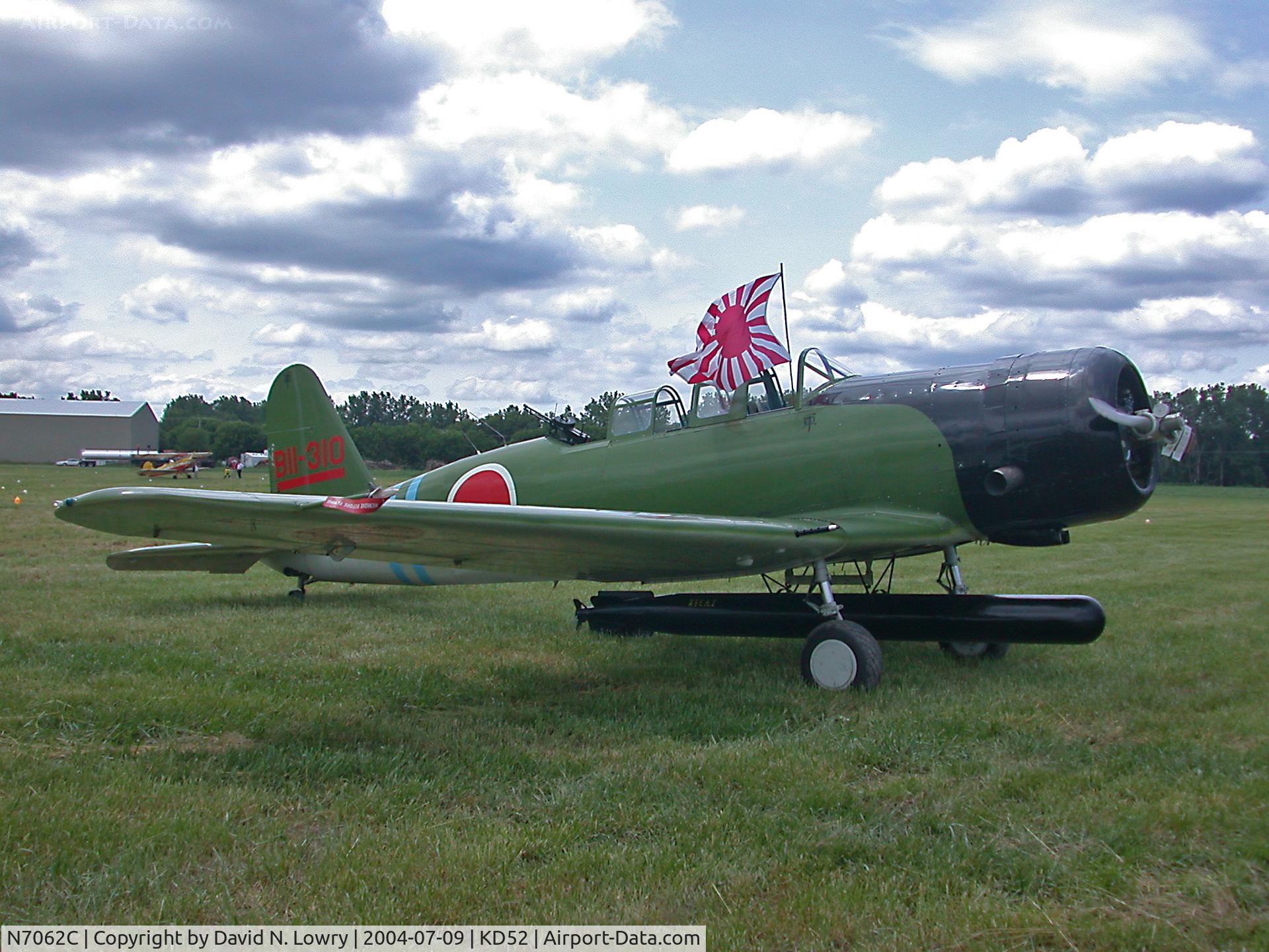 N7062C, 1943 North American SNJ-4 Texan C/N 88-13171, N7062C on the grass at KD52.