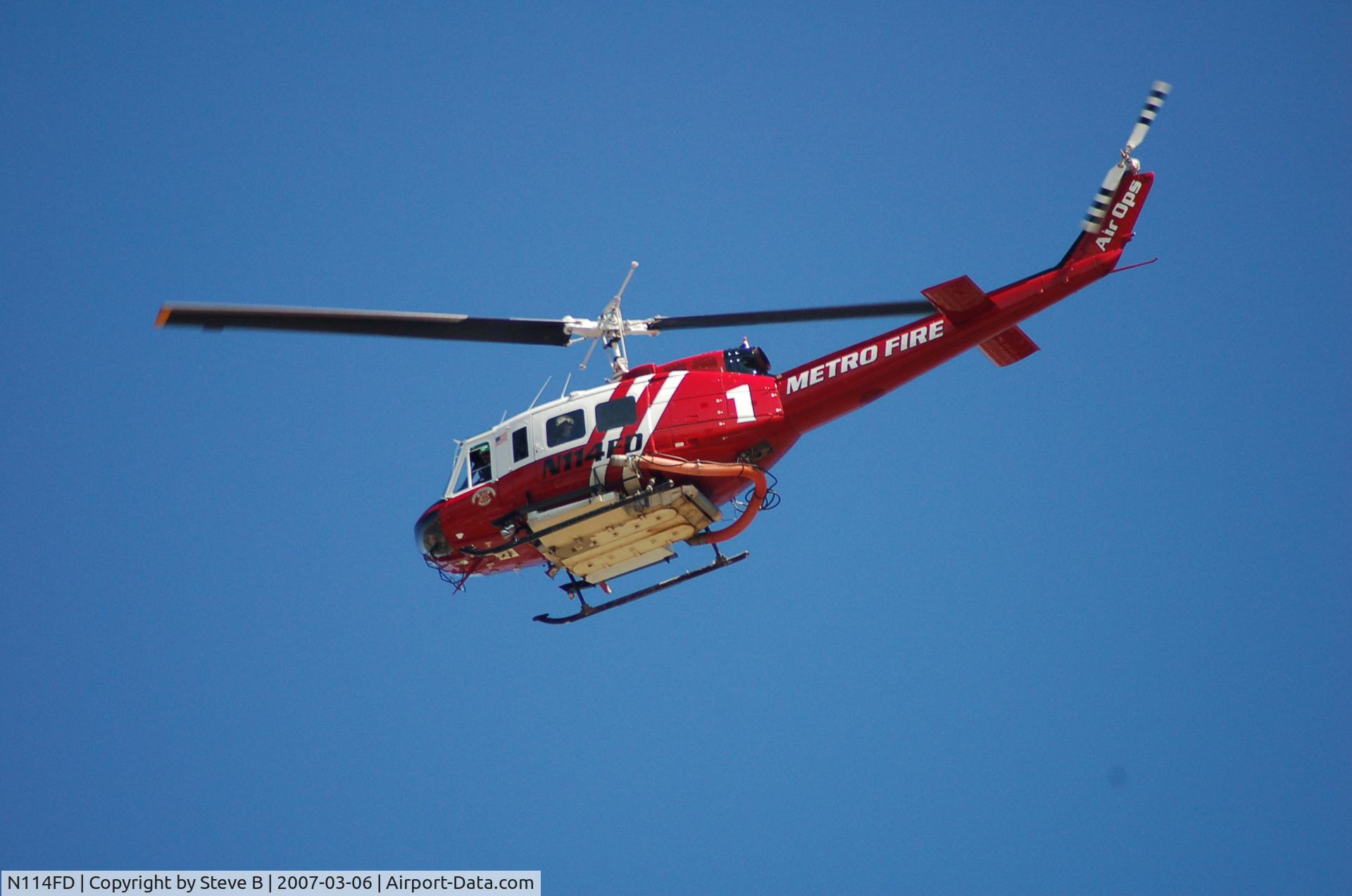 N114FD, Bell UH-1H Iroquois C/N 13257 (72-21558), Fire copter 1 in flight (Rio Linda ,Ca )