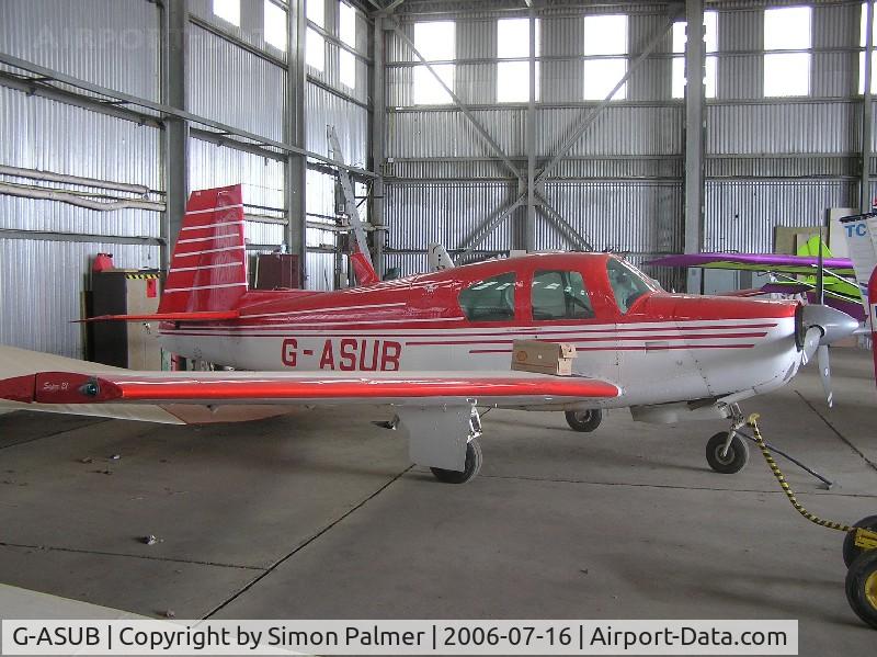 G-ASUB, 1964 Mooney M20E Super 21 C/N 397, Mooney M21 in hangar at North Coates