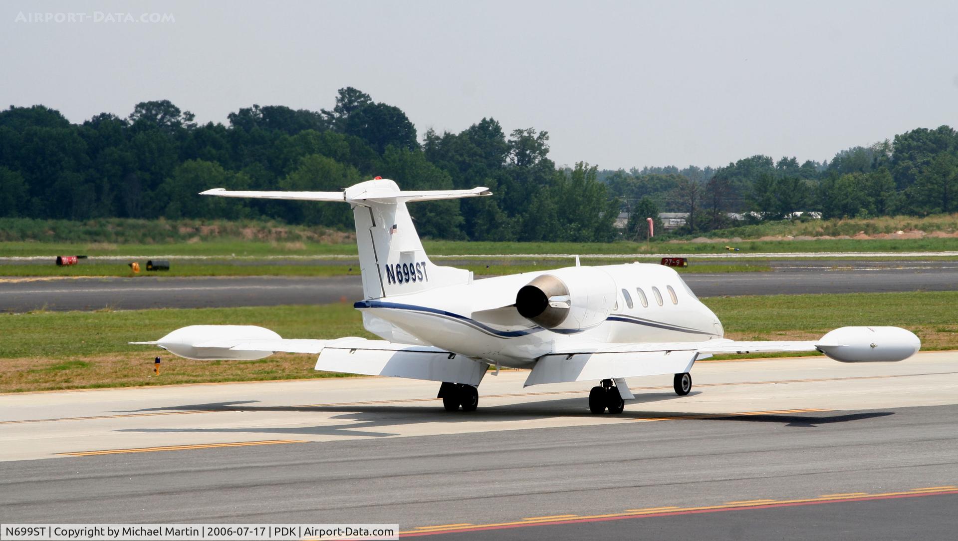 N699ST, 1981 Gates Learjet 35A C/N 441, Leaving Mercury Air Center