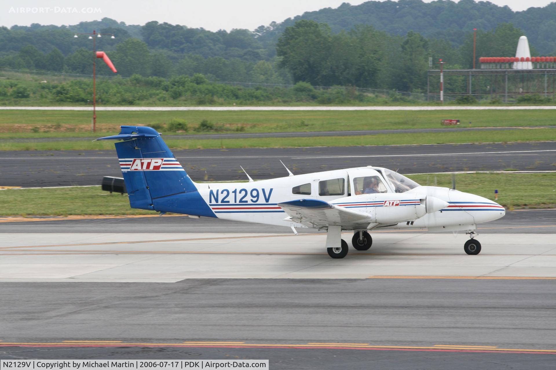 N2129V, 1979 Piper PA-44-180 Seminole C/N 44-7995264, Taxing past Mercury Air Service