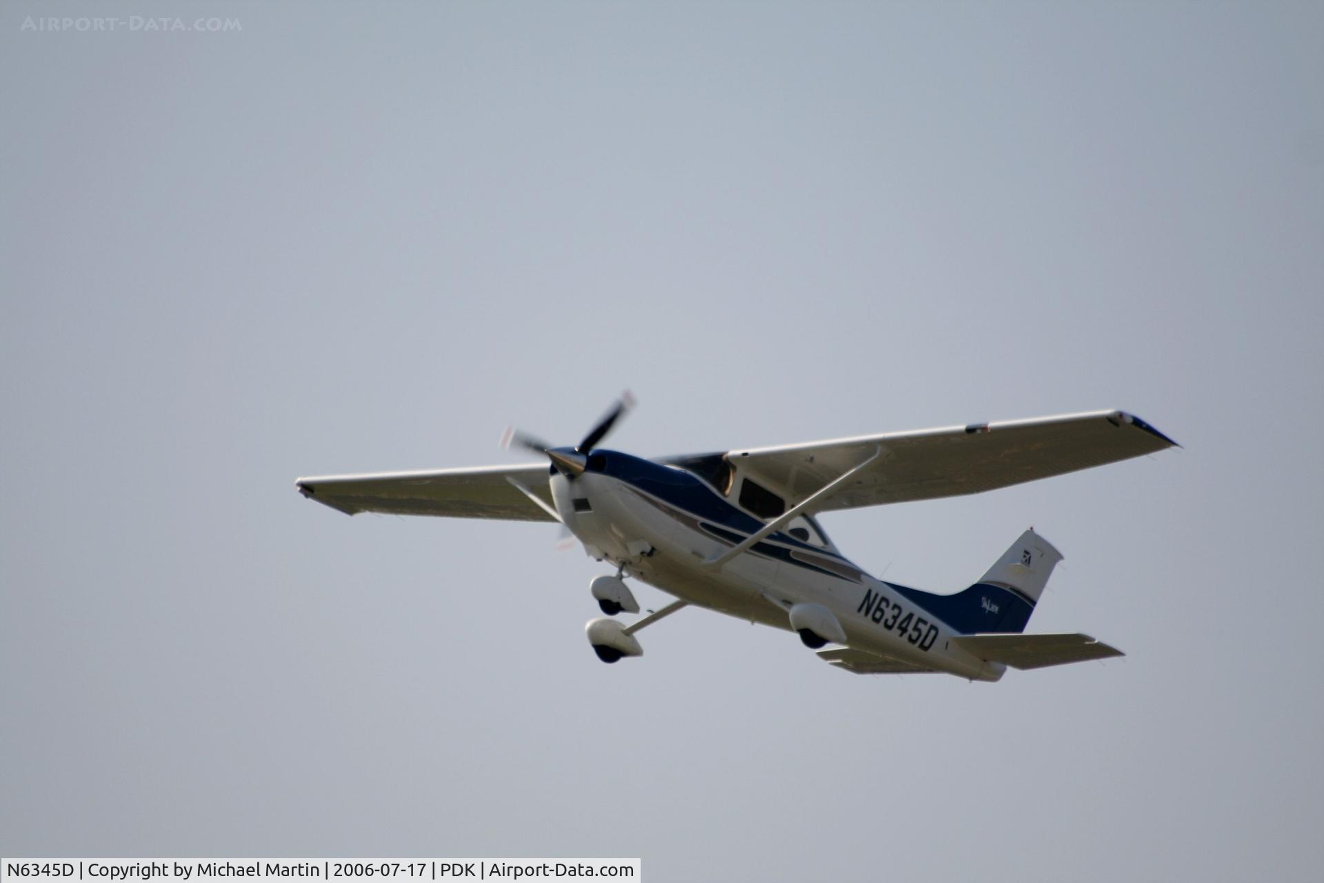 N6345D, 2004 Cessna 182T Skylane C/N 18281401, Over flying PDK