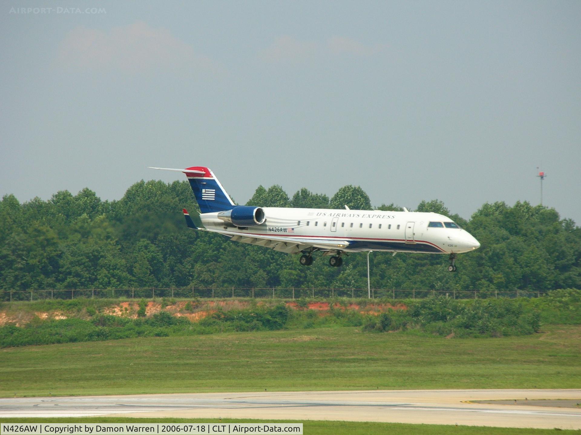 N426AW, 2002 Bombardier CRJ-200LR (CL-600-2B19) C/N 7669, Landing on Runway 18R