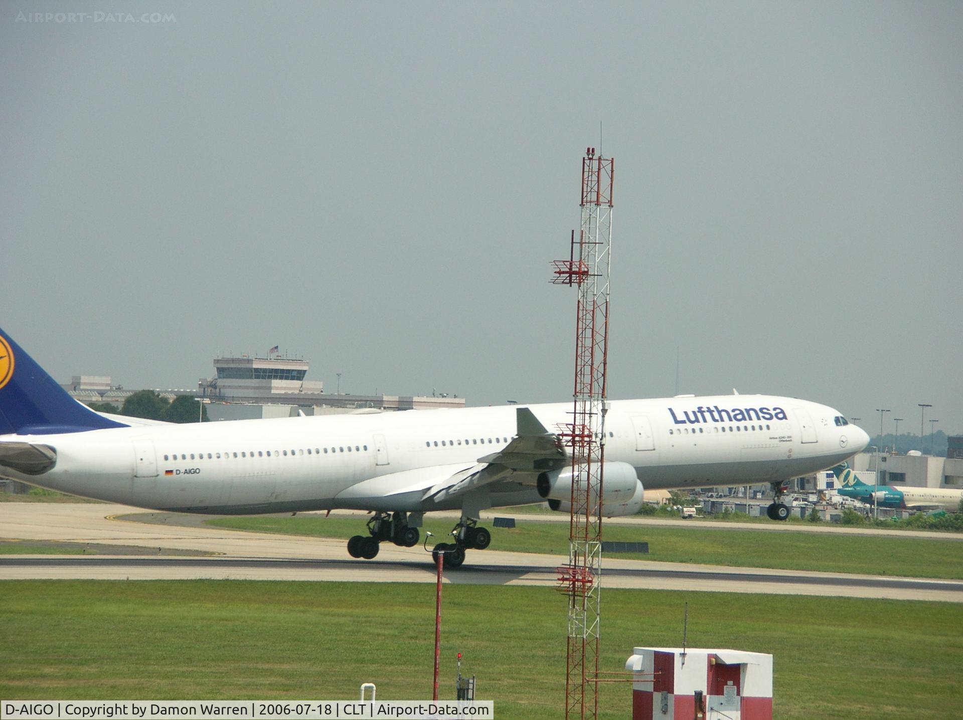 D-AIGO, 1998 Airbus A340-313X C/N 233, Touching down on runway 18R in CLT