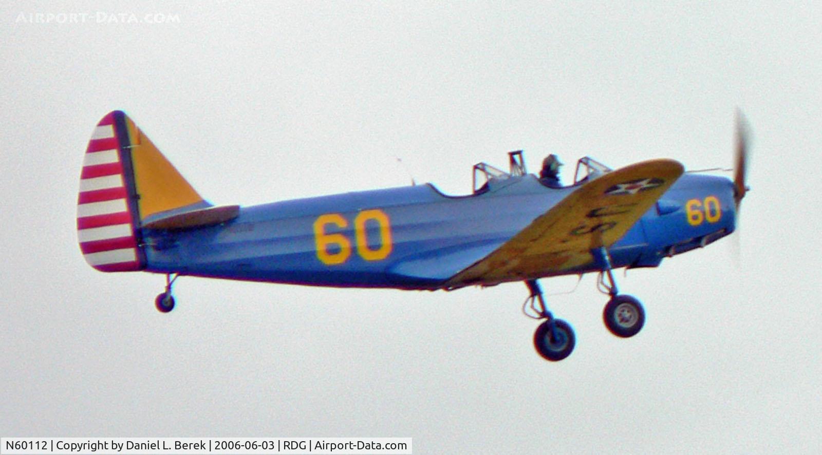 N60112, 1946 Fairchild M-62A C/N T43-5457, Pretty blue 1946 Cornell brightens up an overcast sky at the 2006 Mid Atlantic Air Museum World War II Weekend.