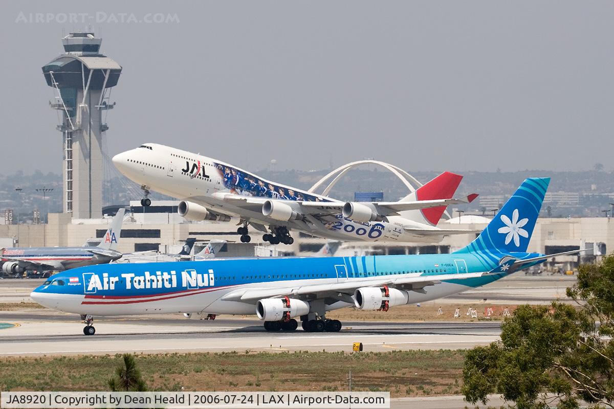 JA8920, 2001 Boeing 747-446 C/N 27648, Japan Airlines JA8920 (FLT JAL69) departing RWY 25R enroute to Kansai Int'l (RJBB) - Osaka, Japan, while Air Tahiti Nui F-OSEA (FLT THT21) rolls out from landing on RWY 25L after arrival from Charles De Gaulle (LFPG) - Paris, France.