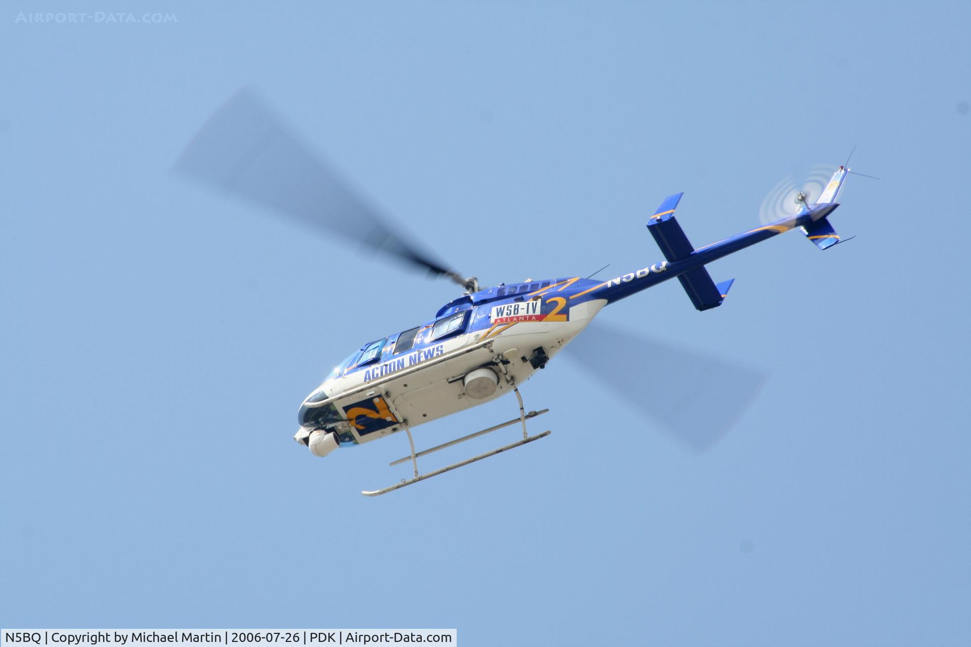 N5BQ, 1992 Bell 206L-4 LongRanger IV LongRanger C/N 52007, WSB TV-2 Action News Helicopter Returning From Story