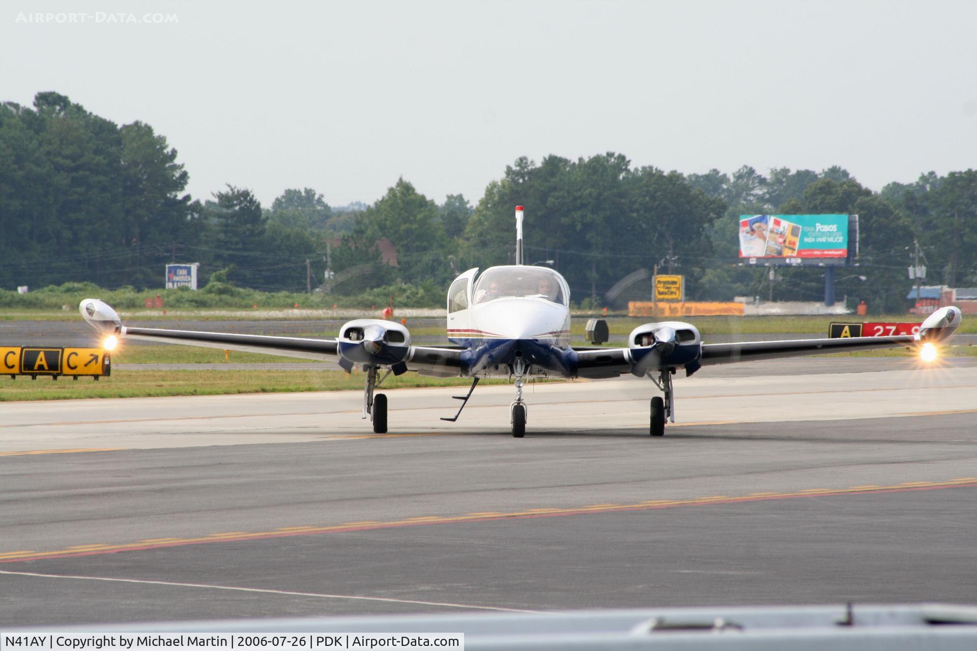 N41AY, 1978 Cessna T310R C/N 310R1416, Head on view - Headlights on Highbeam!