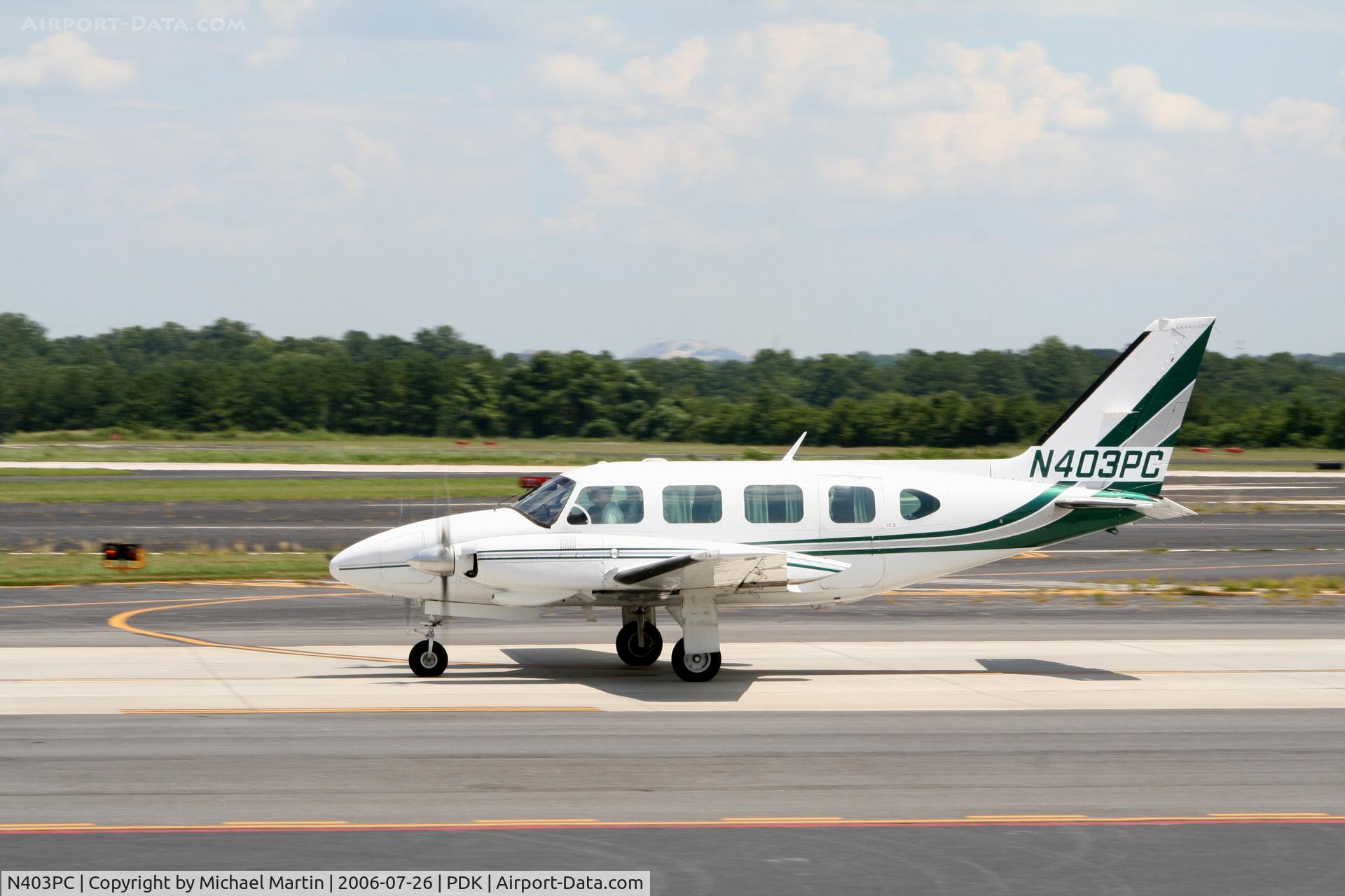 N403PC, 1979 Piper PA-31-325 Navajo C/R C/N 31-7912123, Armadillo Taxing To Hanger