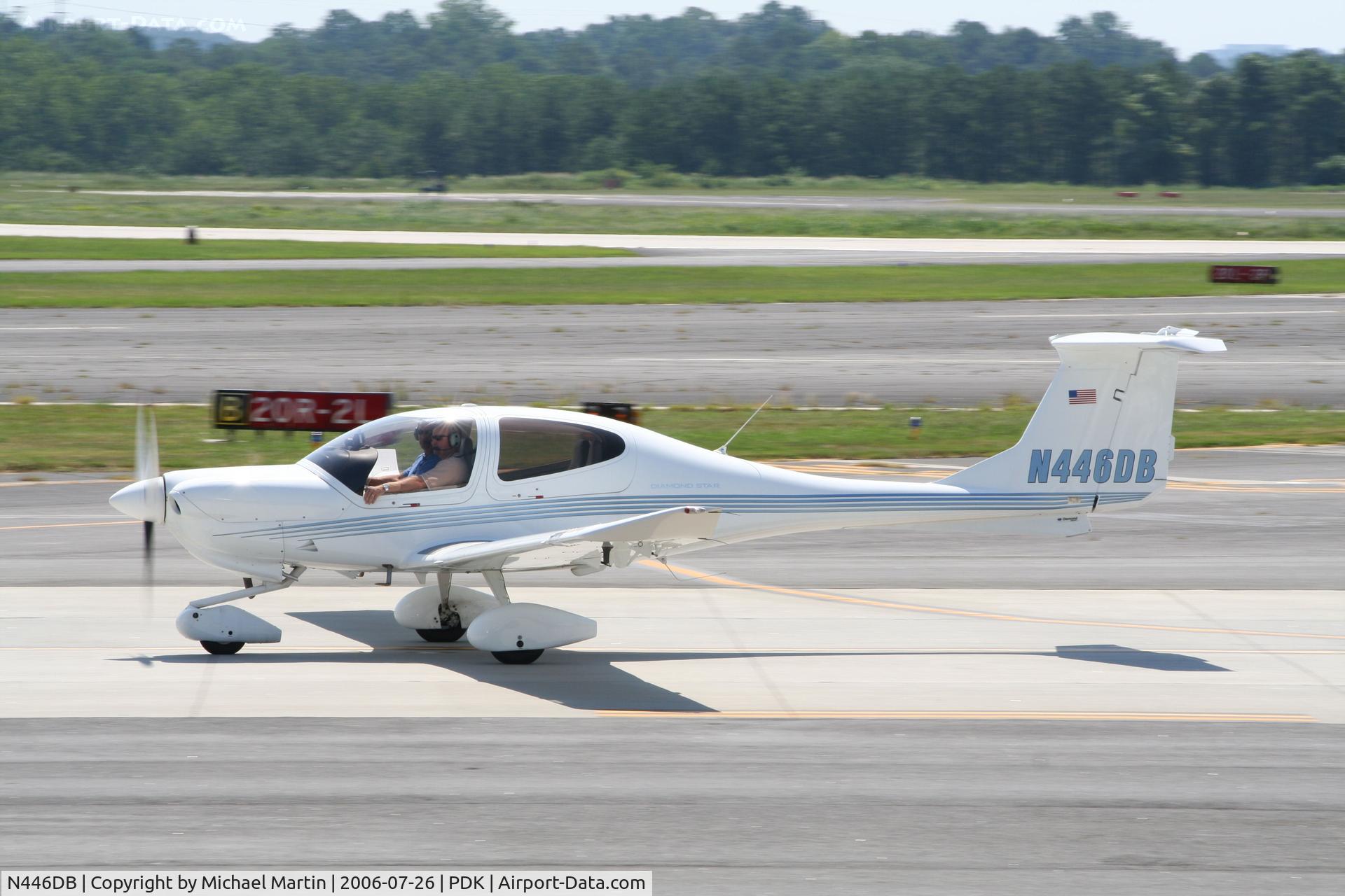 N446DB, Diamond DA-40 Diamond Star C/N 40.273, Taxing past Mercury Air Service