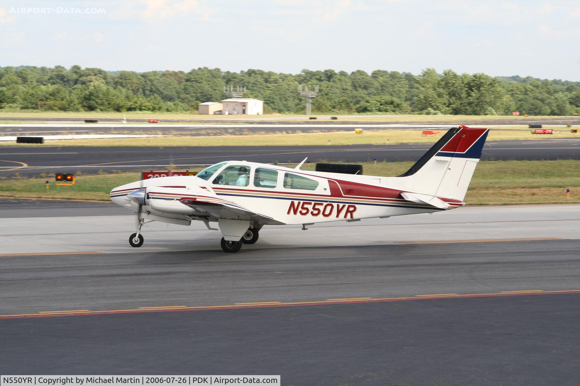 N550YR, 1981 Beech E-55 Baron C/N TE-1196, Taxing from Mercury Air Service