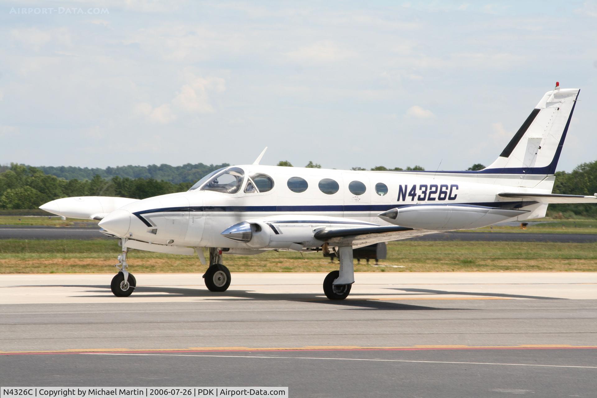 N4326C, 1976 Cessna 340A C/N 340A0075, Taxing to 20L for flight to AFJ