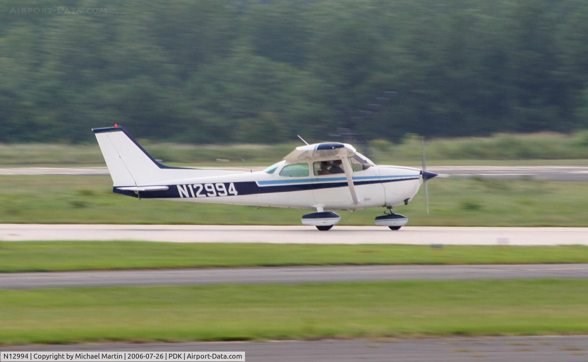 N12994, 1973 Cessna 172M C/N 17262434, Departing 20R enroute to MJD
