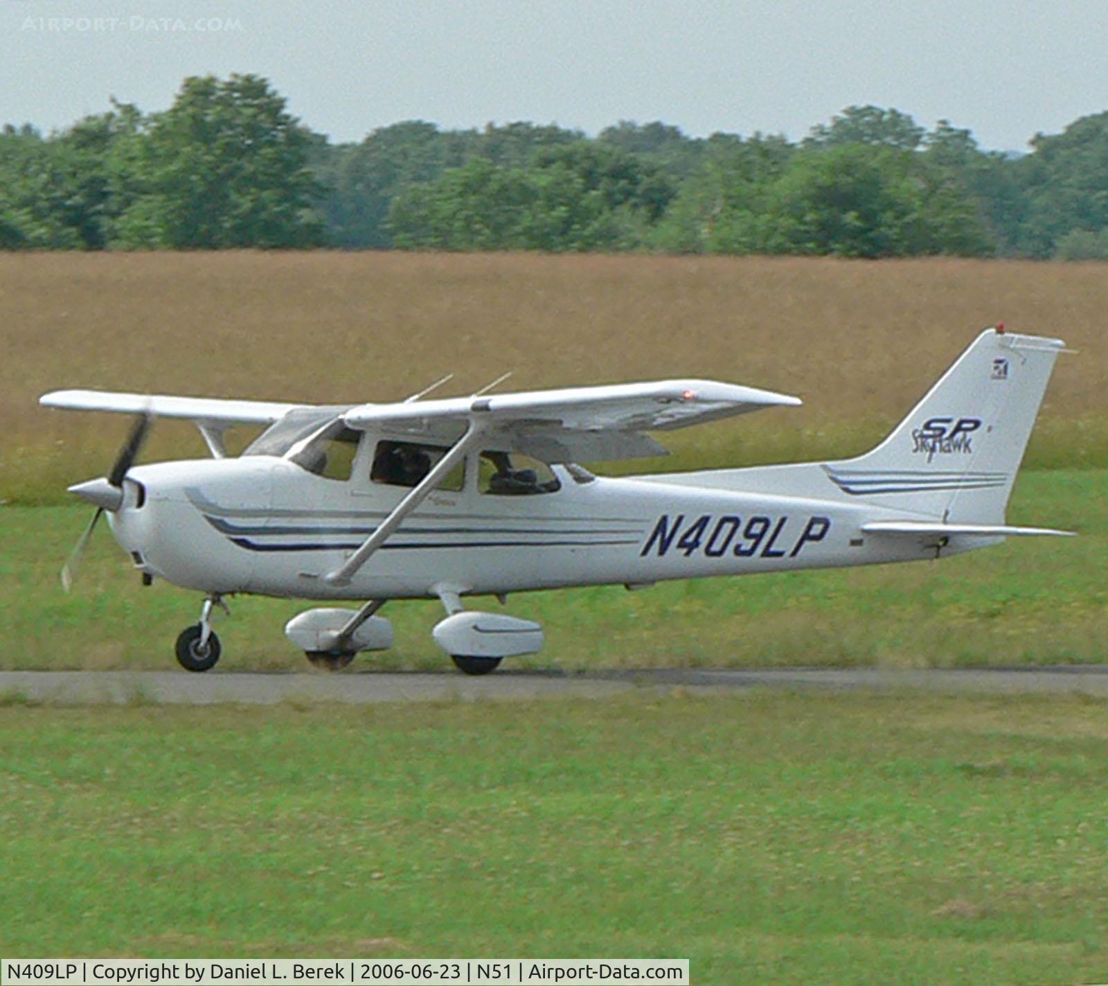 N409LP, 2003 Cessna 172S C/N 172S9409, Handsome 2003 Cessna Skyhawk just landed at Solberg Airport.