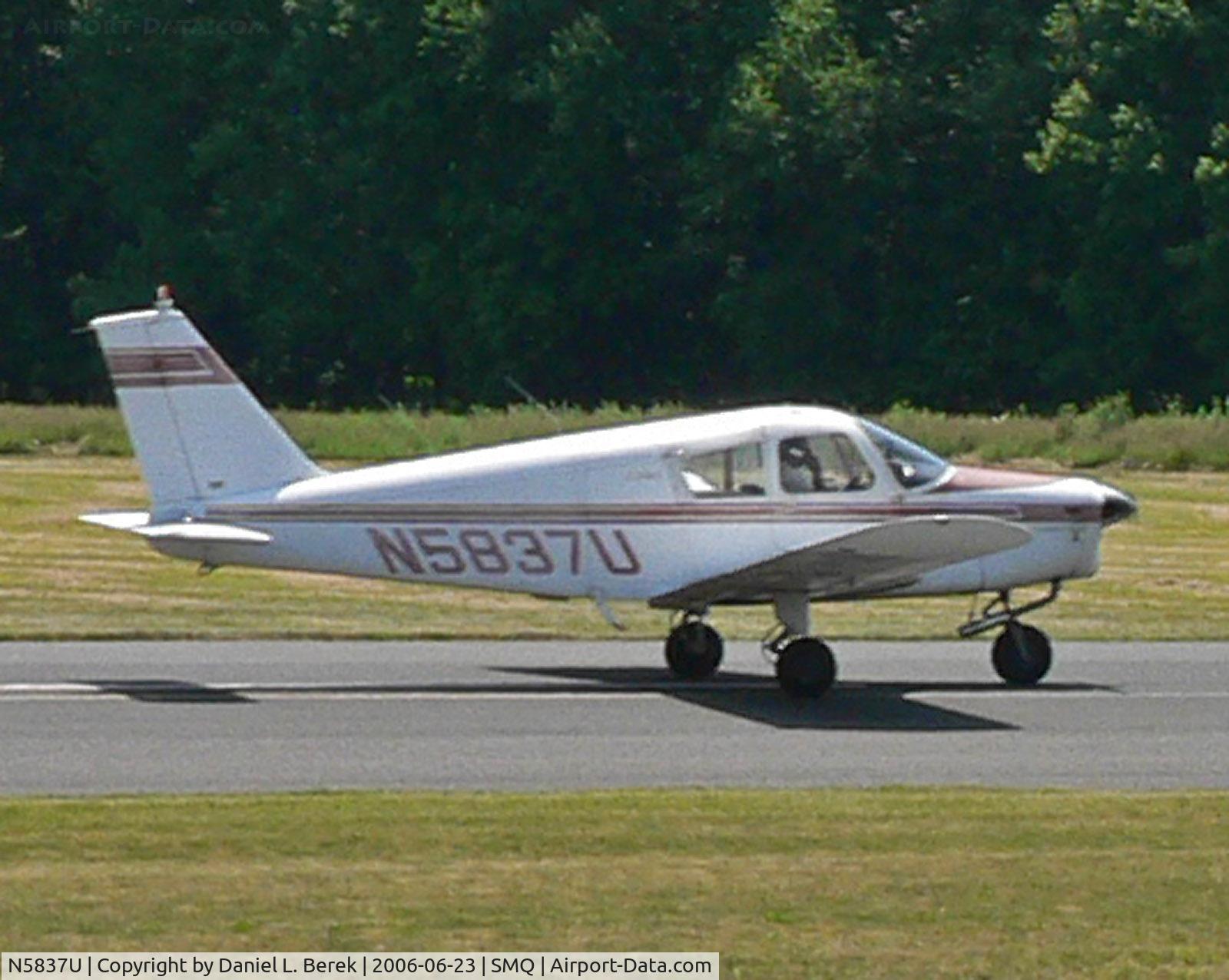 N5837U, 1969 Piper PA-28-140 C/N 28-26668, 1969 Piper Cherokee races down the runway.