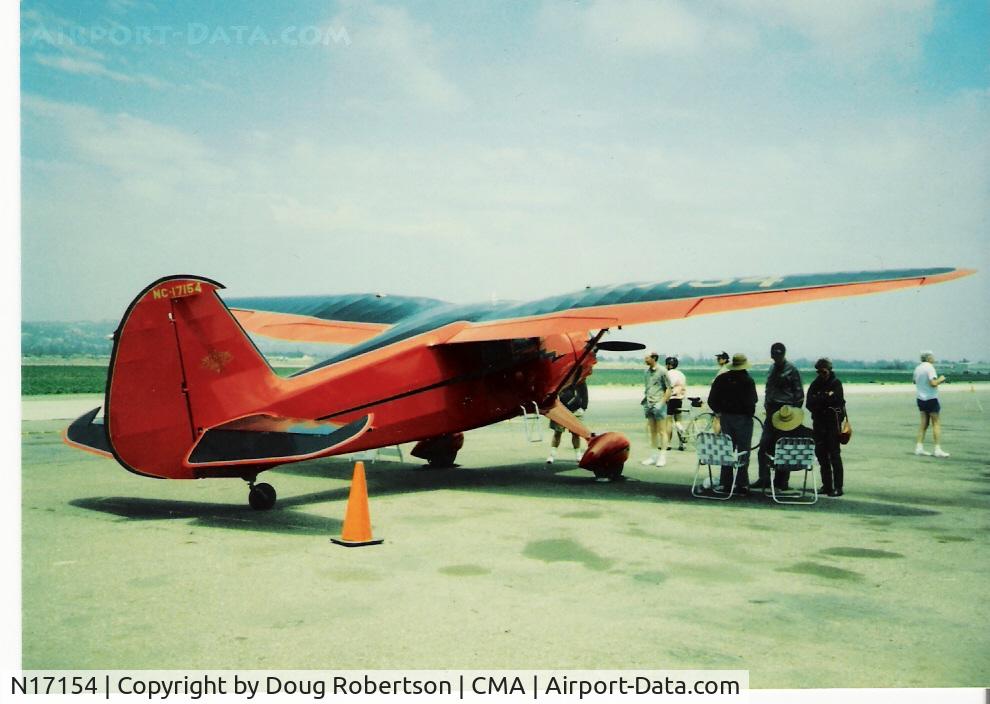 N17154, 1941 Stinson SR-9B Reliant C/N 5115, 1941 Stinson SR-9B RELIANT, Lycoming R680-6B6-D6 245 Hp, view shows the beautifully tapered gull wings shape, flaps & ailerons. Ex-Joe Ware (seated-right) aircraft about 1995. See, read my article here re Stinson Reliants.