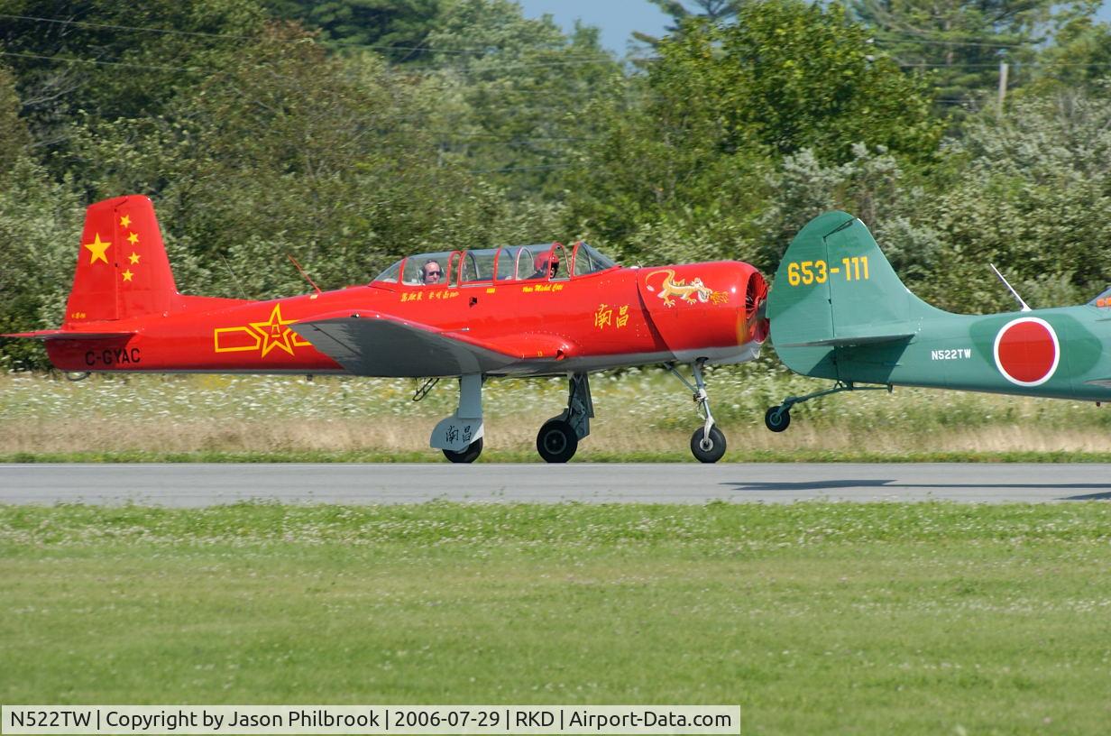 N522TW, 2003 Yakovlev (Aerostar) Yak-52TW C/N 0312407, taking off at an Owls Head Transportation Museum airshow