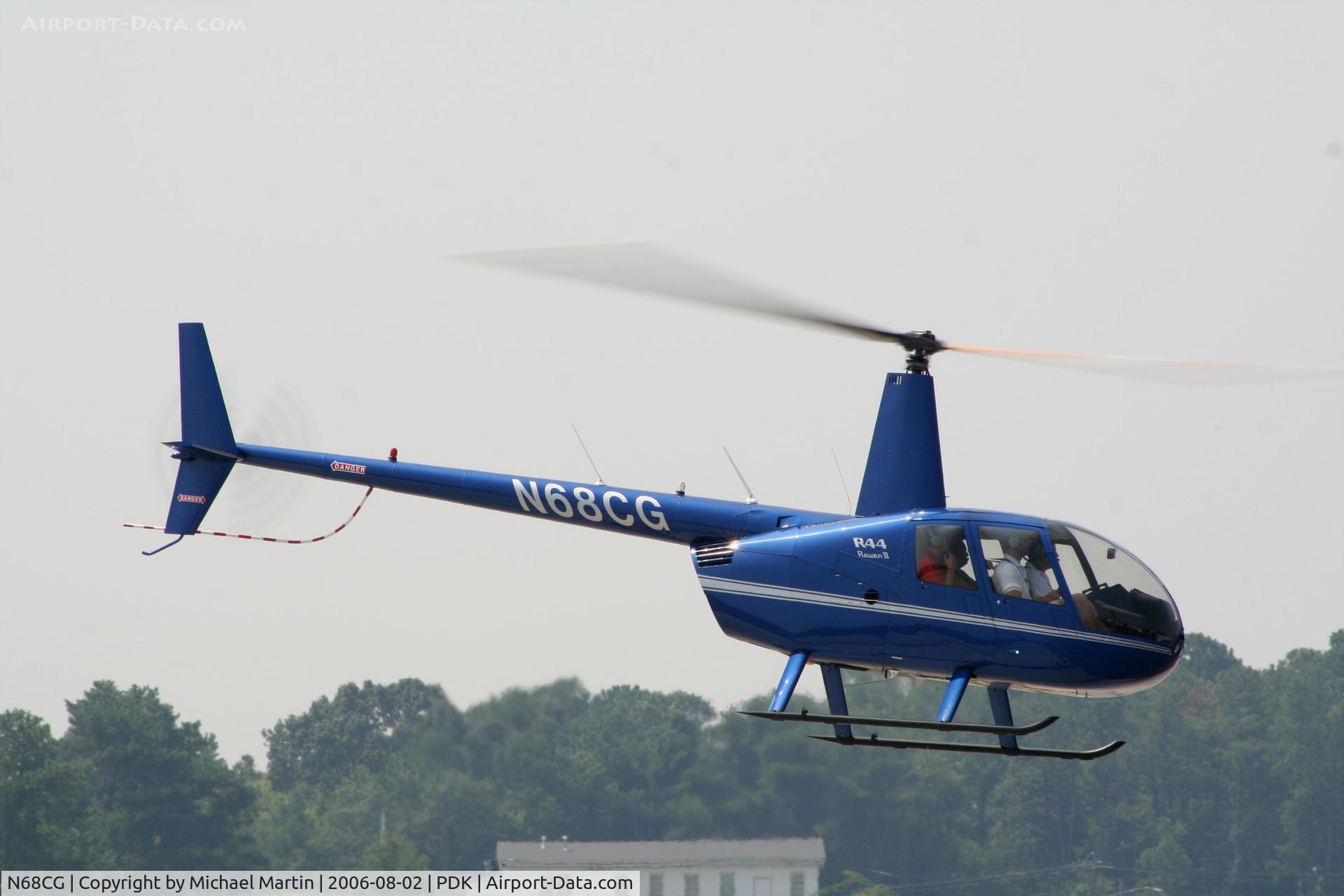 N68CG, 2006 Robinson R44 II C/N 11312, Departing Mercury Air Center after picking up passengers