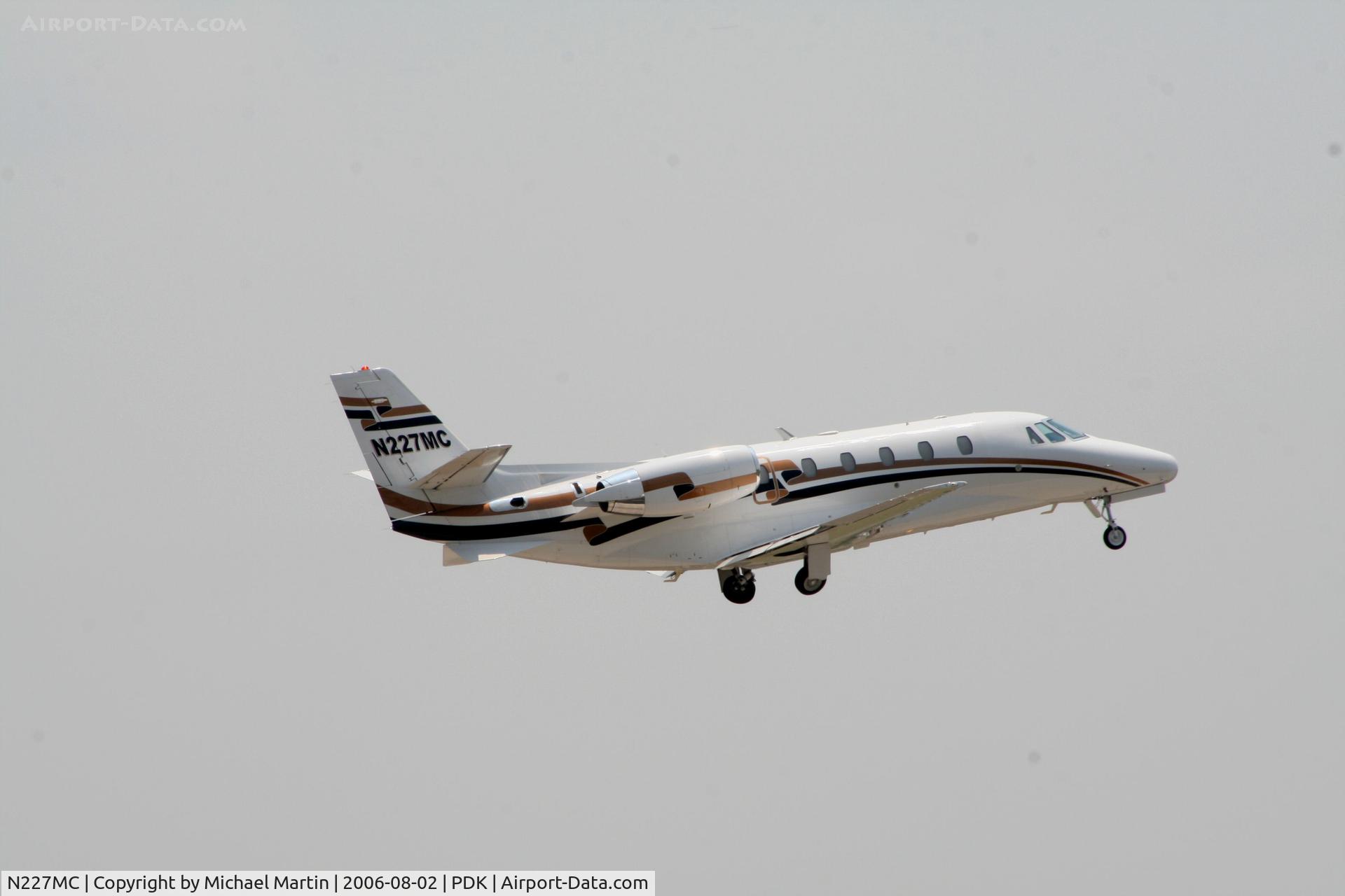 N227MC, 2000 Cessna 560XL C/N 560-5064, Gear up after take off from 20L