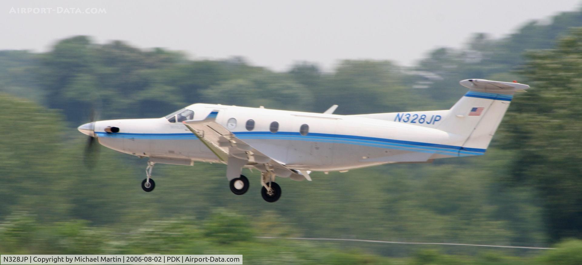 N328JP, 2000 Pilatus PC-12/45 C/N 328, Departing Runway 2R