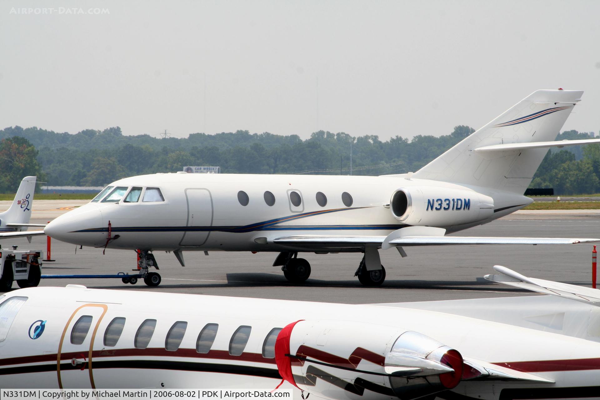 N331DM, 1982 Dassault Fan Jet Falcon (20F) C/N 429, Tied Down @ Mercury Air Center with other A/C