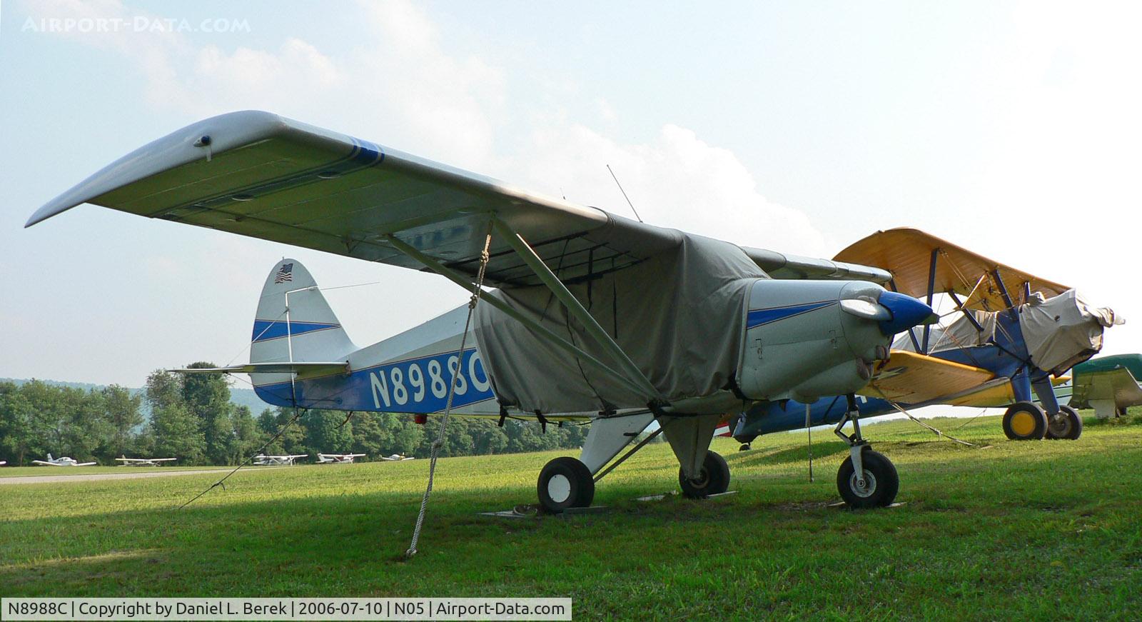 N8988C, 1953 Piper PA-22-135 Tri-Pacer C/N 22-1566, Pretty Piper Tri-Pacer and equally spotless Stearman keep each other company.