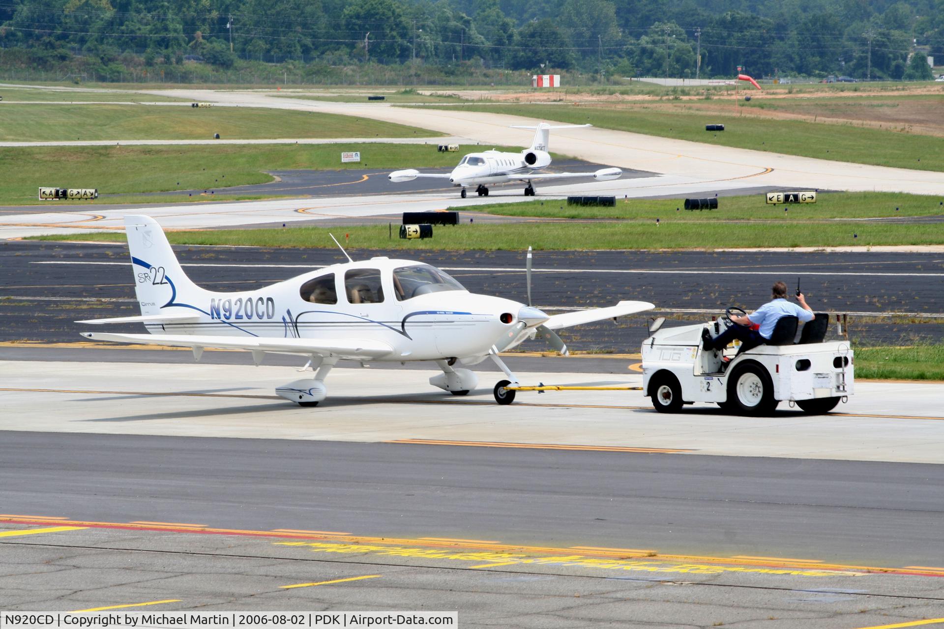 N920CD, 2002 Cirrus SR22 C/N 0279, Being towed to parking at Mercury Air Center