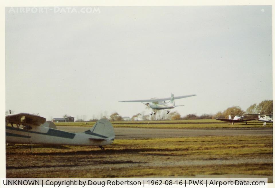 UNKNOWN, Miscellaneous Various C/N unknown, 1959 Cessna 172, Continental O-300A 145 Hp near touchdown at PWK, Cessna 195 tied down in foreground. Field was called Palwaukee Airport at the time.