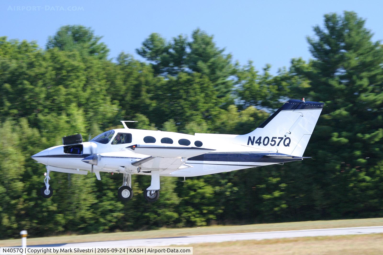 N4057Q, 1969 Cessna 401A C/N 401A0109, Cessna with trunk open on take off at Daniel Webster College Airshow 2005