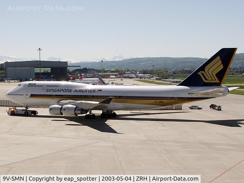 9V-SMN, 1992 Boeing 747-412 C/N 26548, towing the a/c to the gate