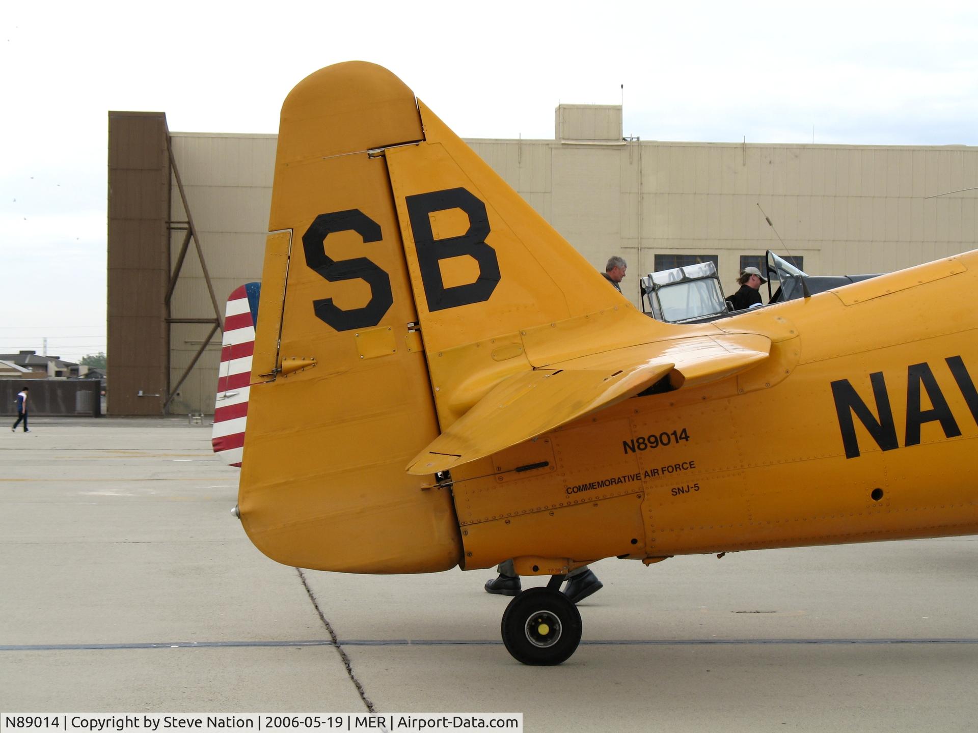 N89014, 1943 North American SNJ-5 Texan Texan C/N 84865, Close-up of Commerative Air Force SNJ-5 SB/ (BuAer 84865) in poor weather @ Castle AFB, CA