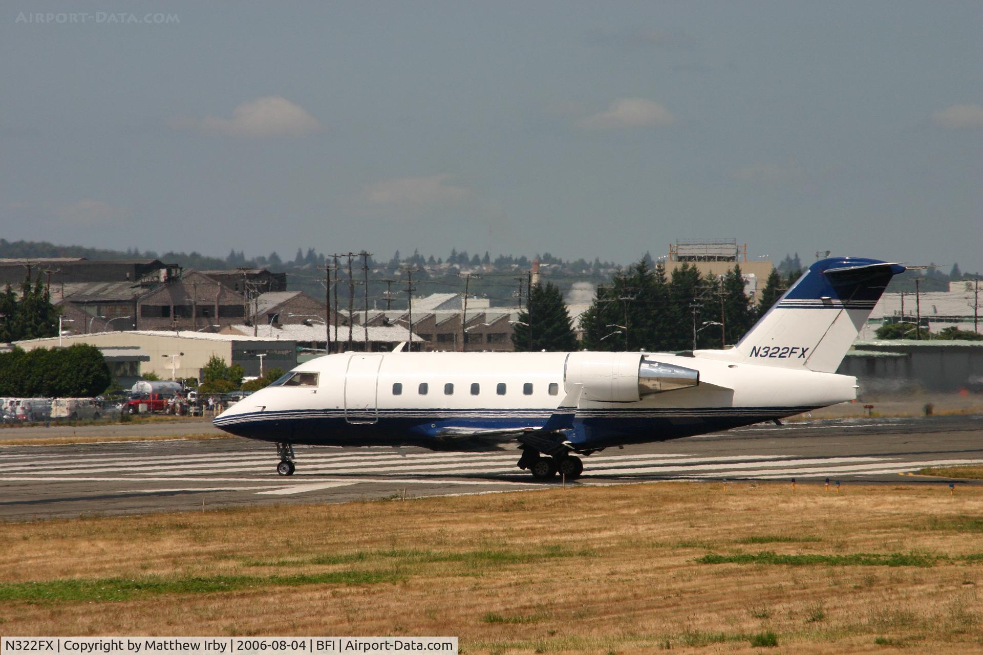 N322FX, 1999 Bombardier Challenger 604 (CL-600-2B16) C/N 5434, N322FX taxiing to Runway 31L for take-off