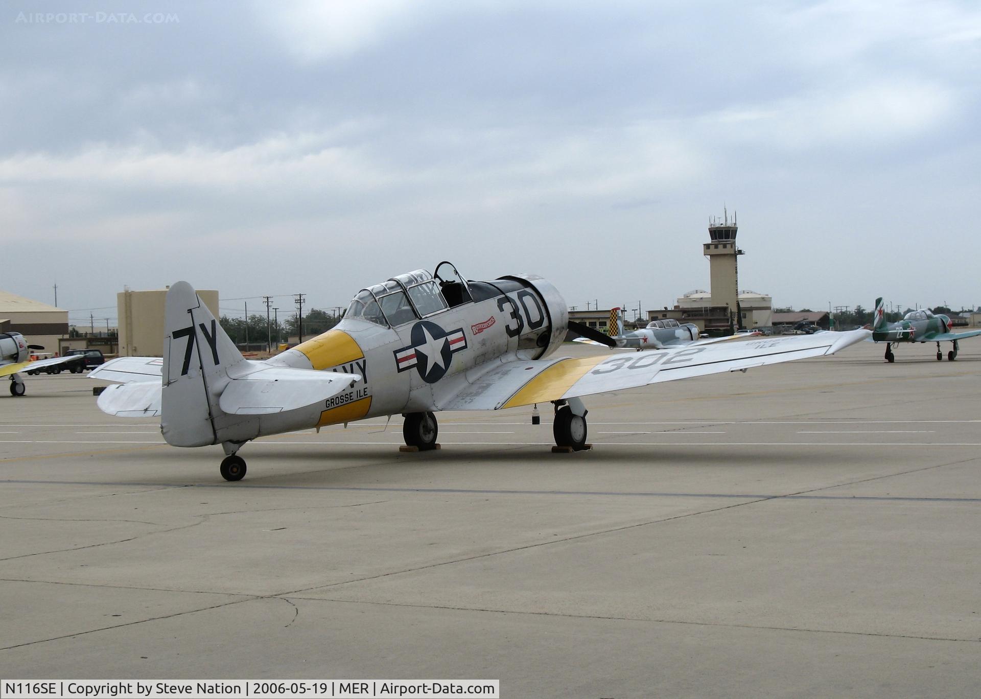 N116SE, 1959 North American T-6G Texan C/N 168-406, North American T-6G as 7Y/302 (wing) Grosse Isle/30 (nose) @ Castle AFB, CA