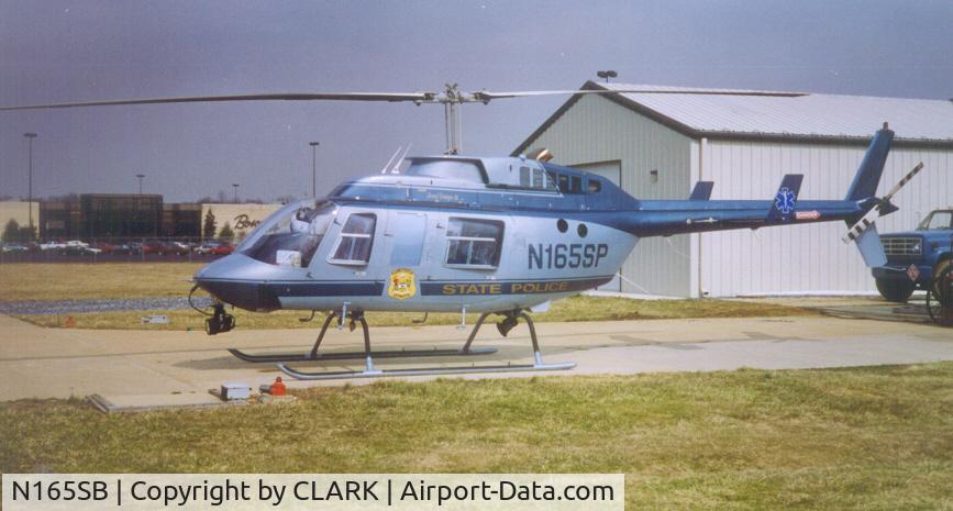 N165SB, 1989 Bell 206L-3 LongRanger III C/N 51327, S/N 51327 as N165SP when owned by DSP @ Heliport Dover, DE
