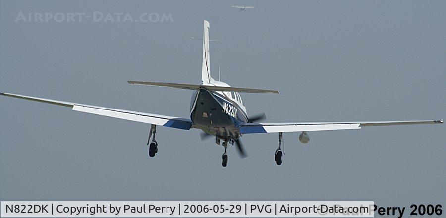N822DK, 1998 Piper PA-46-350P Malibu Mirage C/N 4636160, Over the numbers, and coming down.  Decent view of the pod under the starboard wing