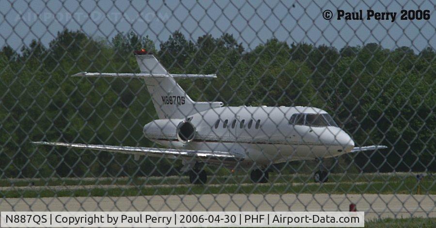 N887QS, 1998 Raytheon Hawker 800XP C/N 258387, Yeah, like I wouldn't shoot through a fence!