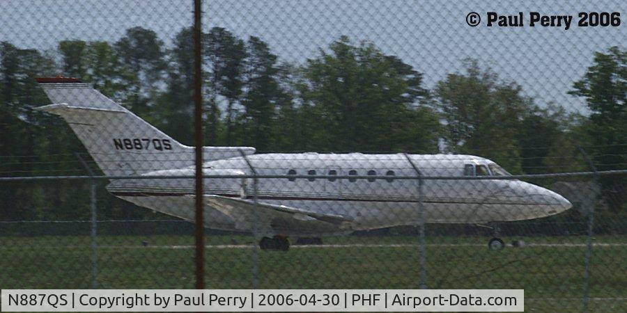 N887QS, 1998 Raytheon Hawker 800XP C/N 258387, Good profile, despite the chain-link