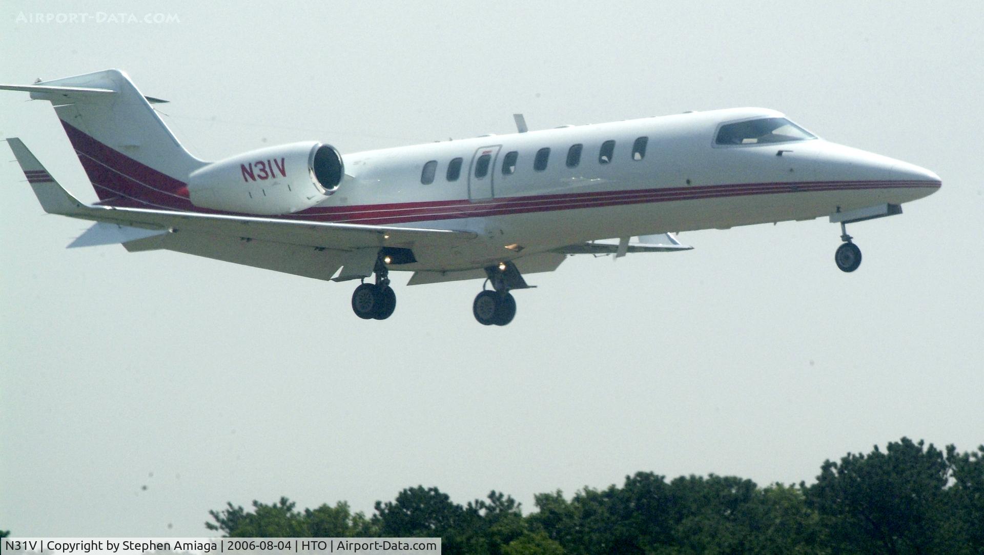 N31V, 1998 Learjet Inc 45 C/N 015, Short Final to HTO RWY 28...