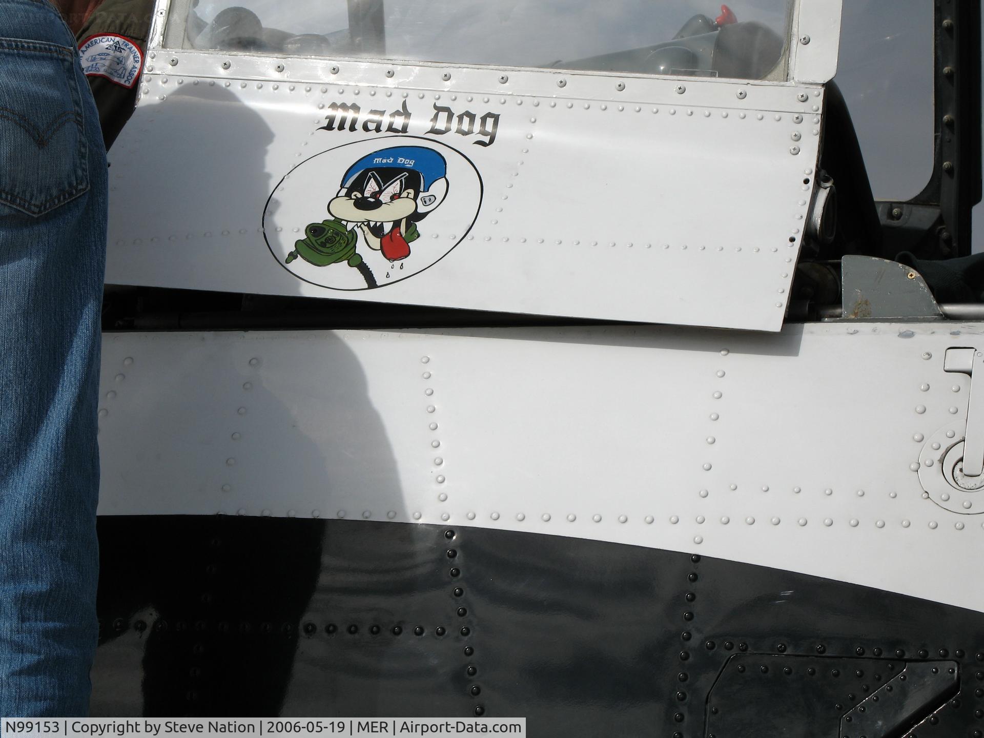 N99153, 1952 North American T-28C Trojan Trojan C/N 226-93, Mad Dog logo