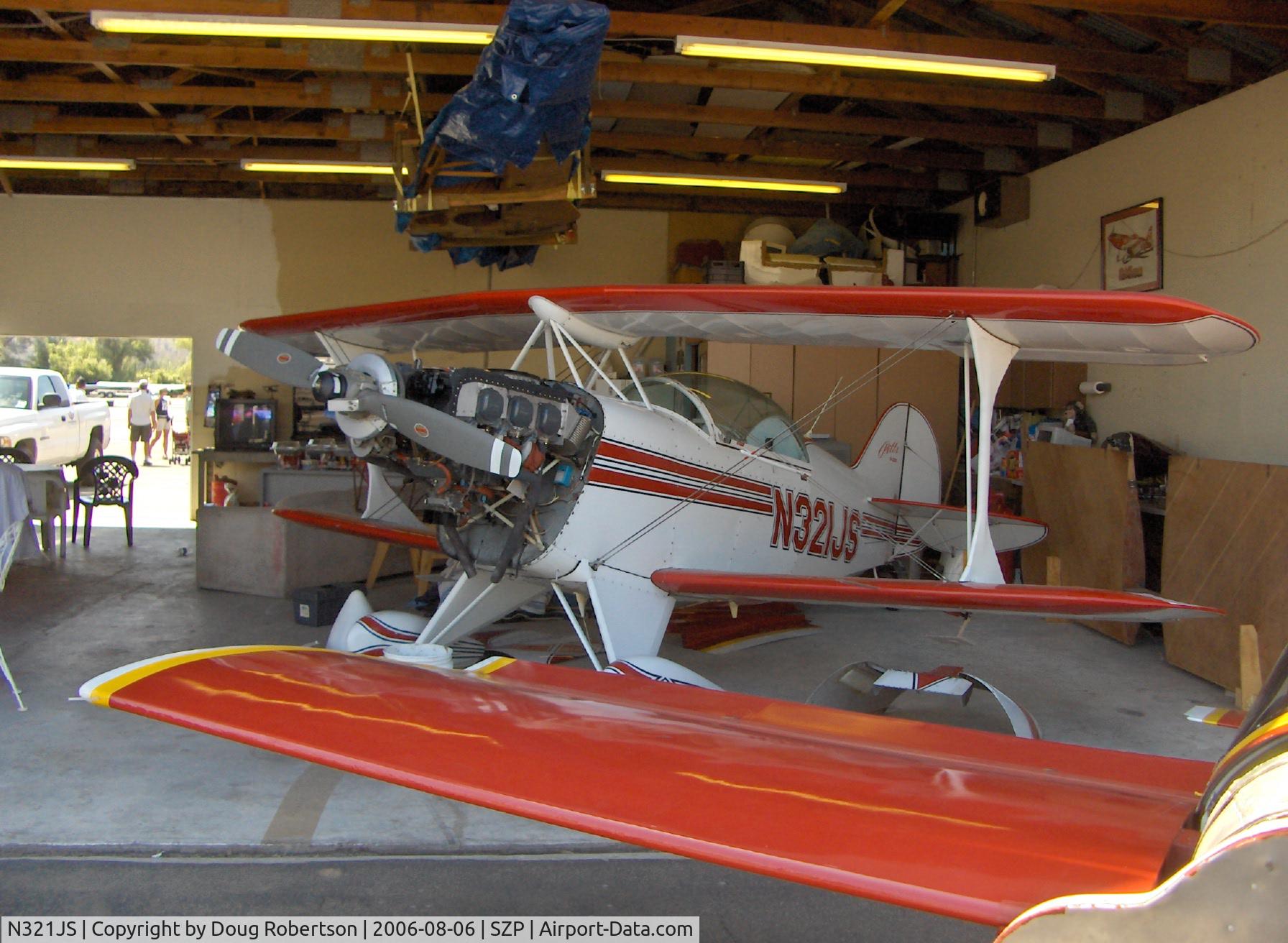 N321JS, 1992 Aviat Pitts S-2B Special C/N 5252, 1992 Aviat PITTS S-2B, Lycoming AEIO-540, maintenance, N99UX CASSUTT III M RACER wing foreground
