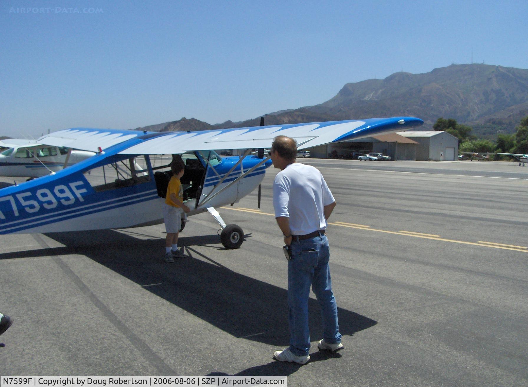 N7599F, 1970 Champion 7ECA Citabria C/N 745-70, 1970 Champion 7ECA CITABRIA, Lycoming O-235 115 Hp, 'Young Eagle' disembarking & proud Dad