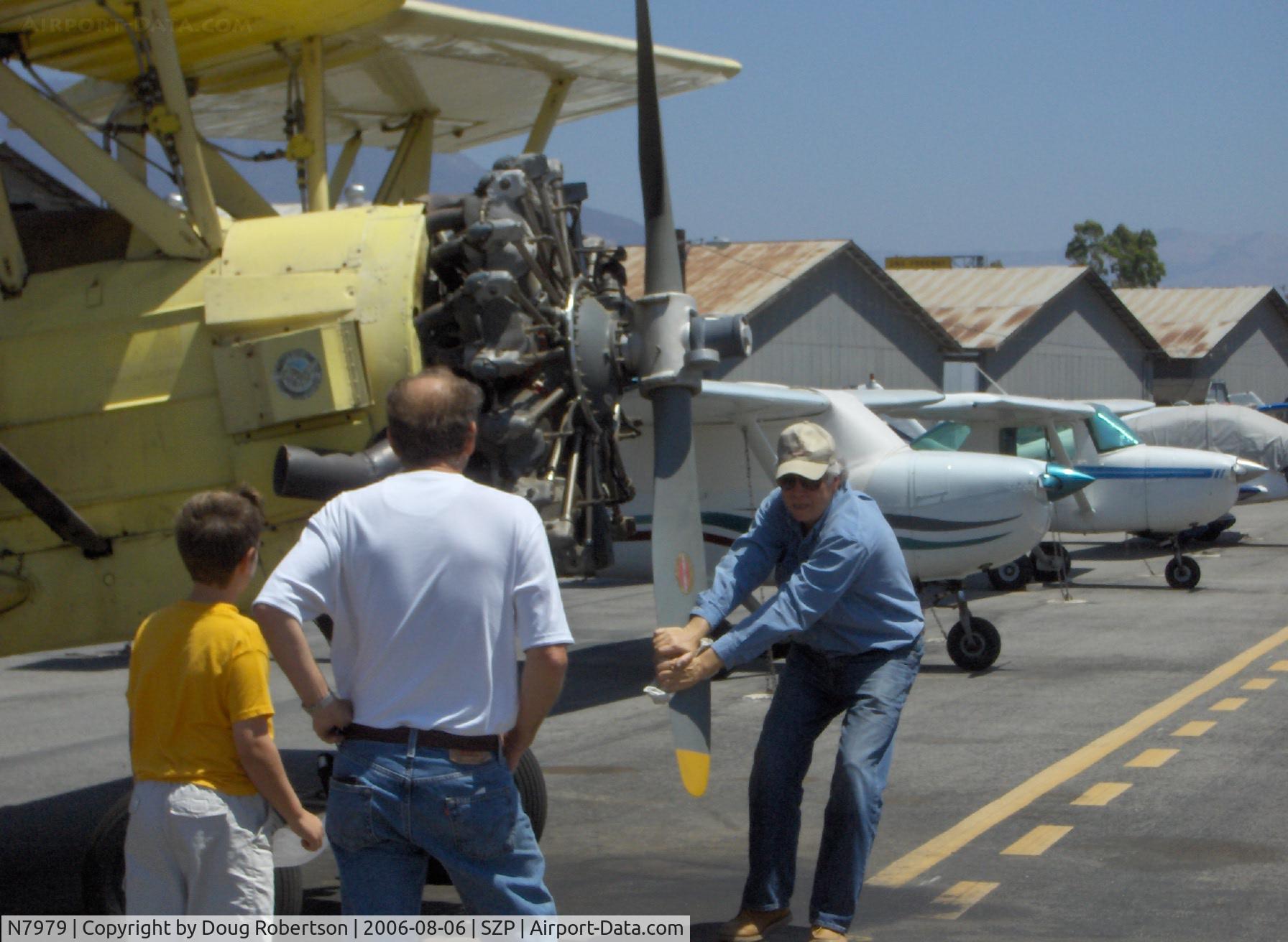 N7979, 1971 Grumman G-164A Super Ag-Cat C/N 843, 1971 Grumman-Schweizer G-164 AG-CAT, P&W R1340, pulling prop through prior to start, Restricted class banner towing