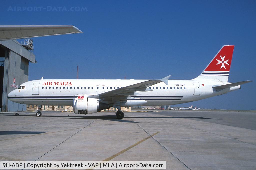 9H-ABP, 1990 Airbus A320-211 C/N 112, Air Malta Airbus A320 being towed into the hangar