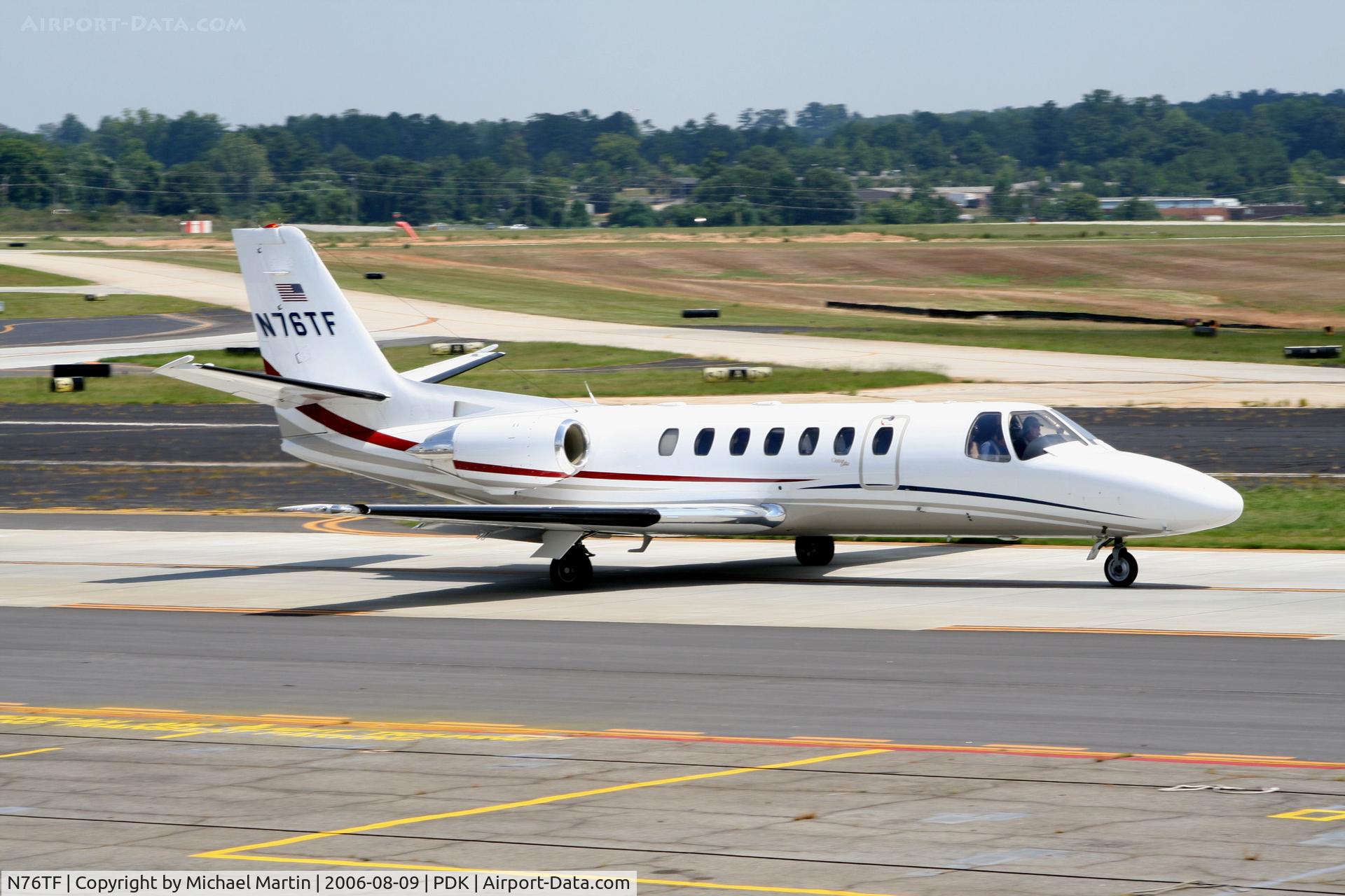 N76TF, 1997 Cessna 560 C/N 560-0431, Taxing past Mercury Air Service