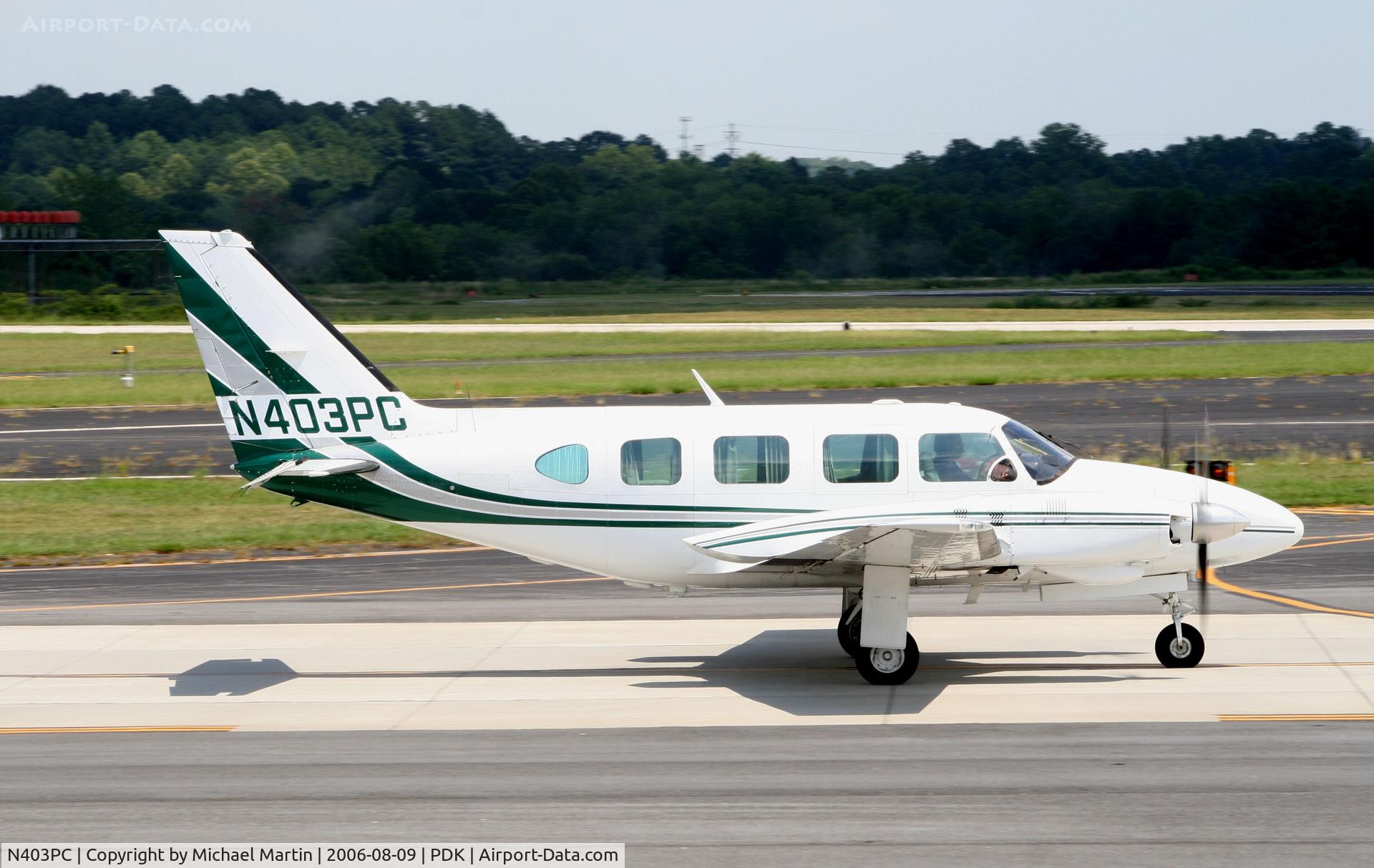 N403PC, 1979 Piper PA-31-325 Navajo C/R C/N 31-7912123, Taxing to Runway 2R