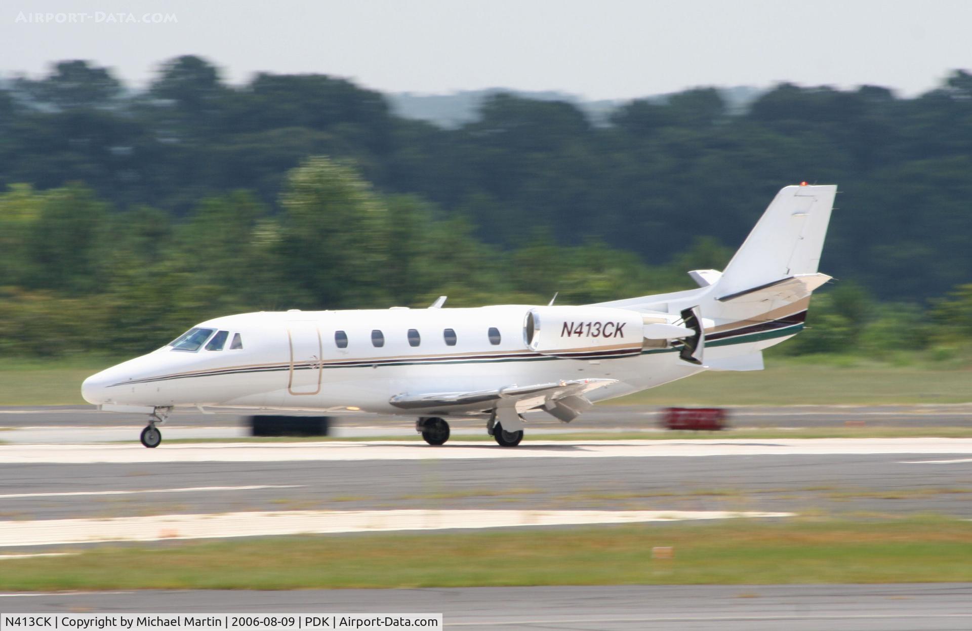 N413CK, 1999 Cessna 560XL C/N 560-5042, Landing Runway 2R