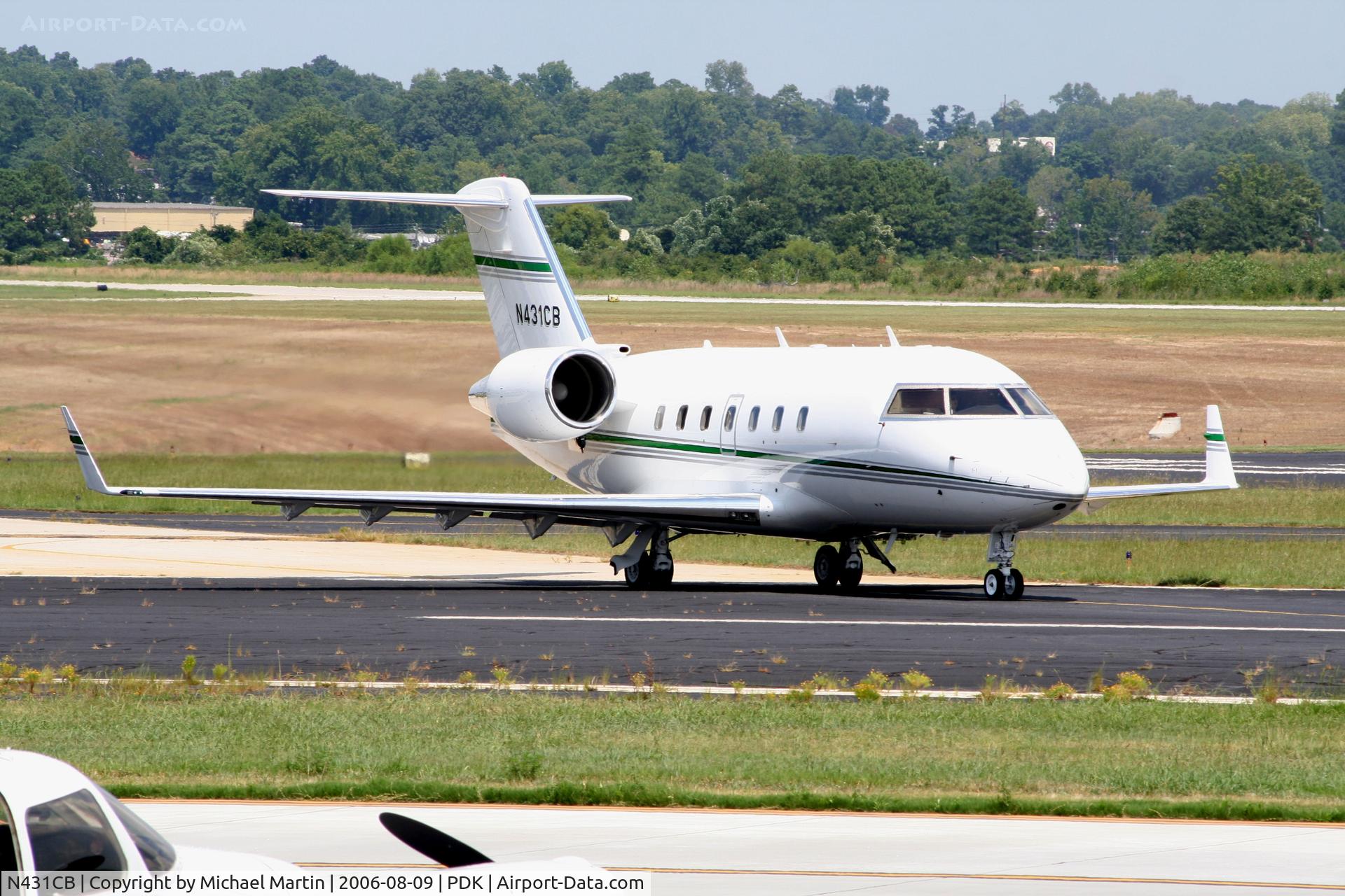 N431CB, 1994 Canadair Challenger 601-3R (CL-600-2B16) C/N 5164, Taxing to Mercury Air Center