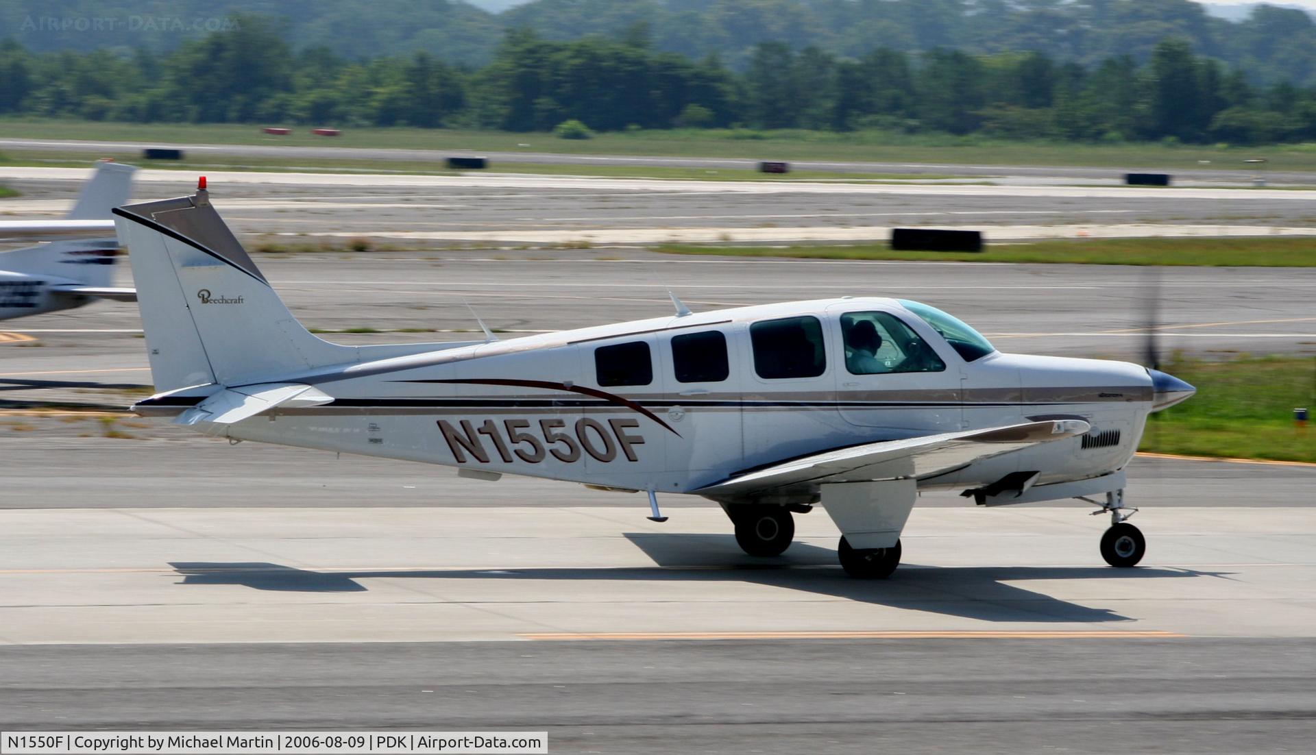 N1550F, 1989 Beech A36 Bonanza 36 C/N E-2480, Taxing to Runway 2L
