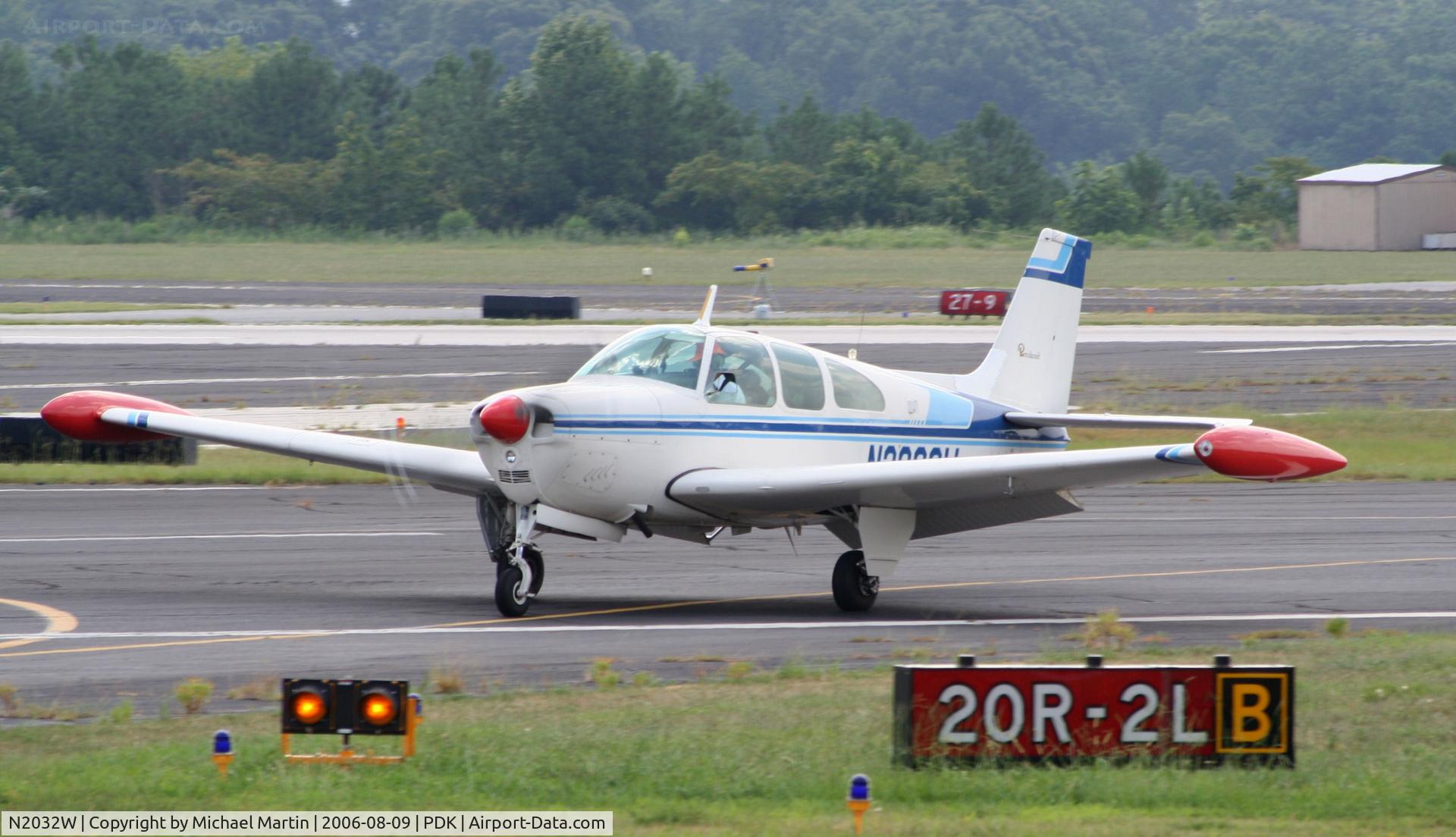 N2032W, 1965 Beech 35-C33 Debonair C/N CD-977, Taxing to tiedown